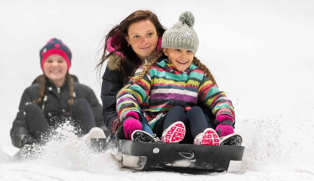 Tobogganing Mum and Daughter at SnowDom