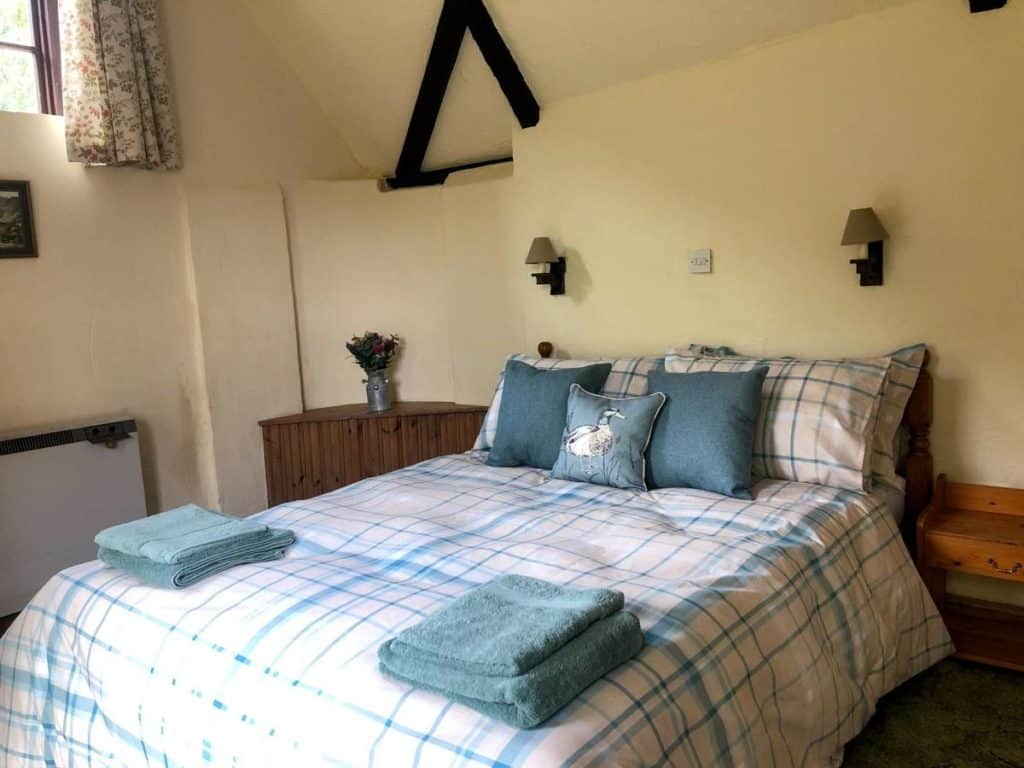 Inside a double-bed kid-friendly room of a popular accommodation at Beachborough Park 