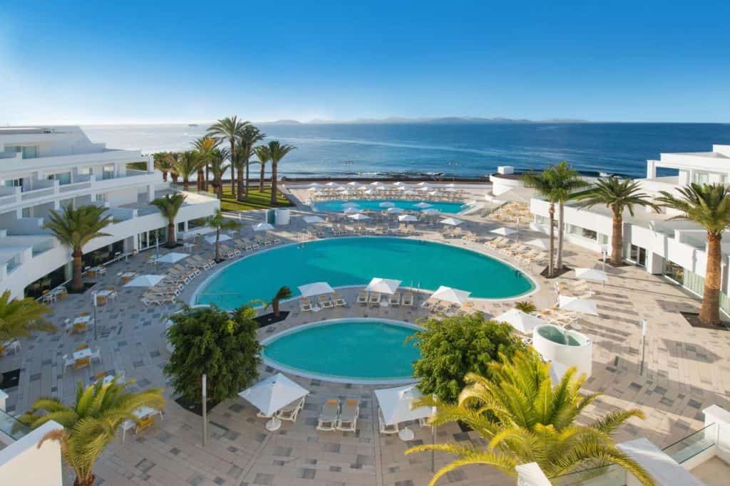 swimming pool, resort and beach at iberostar selection lanzarote park