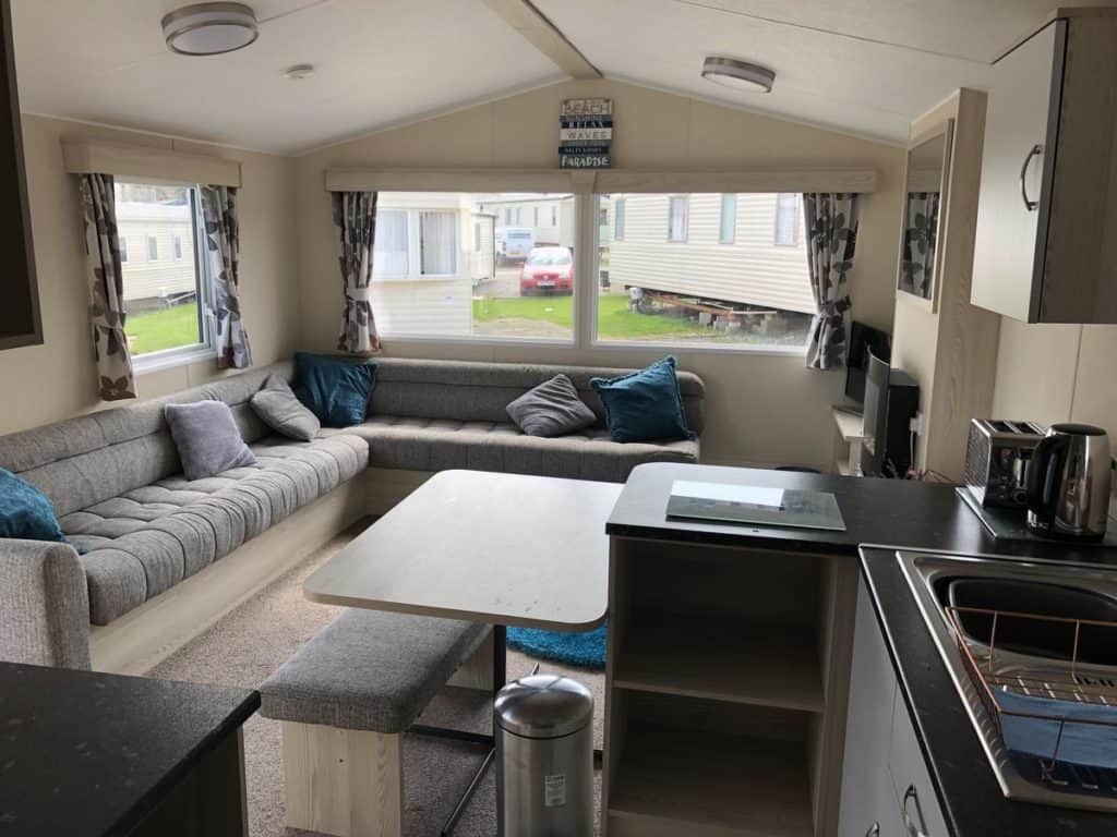 Inside a family-friendly caravan accommodation that sleeps 6 at Marton Mere (Holiday Park)