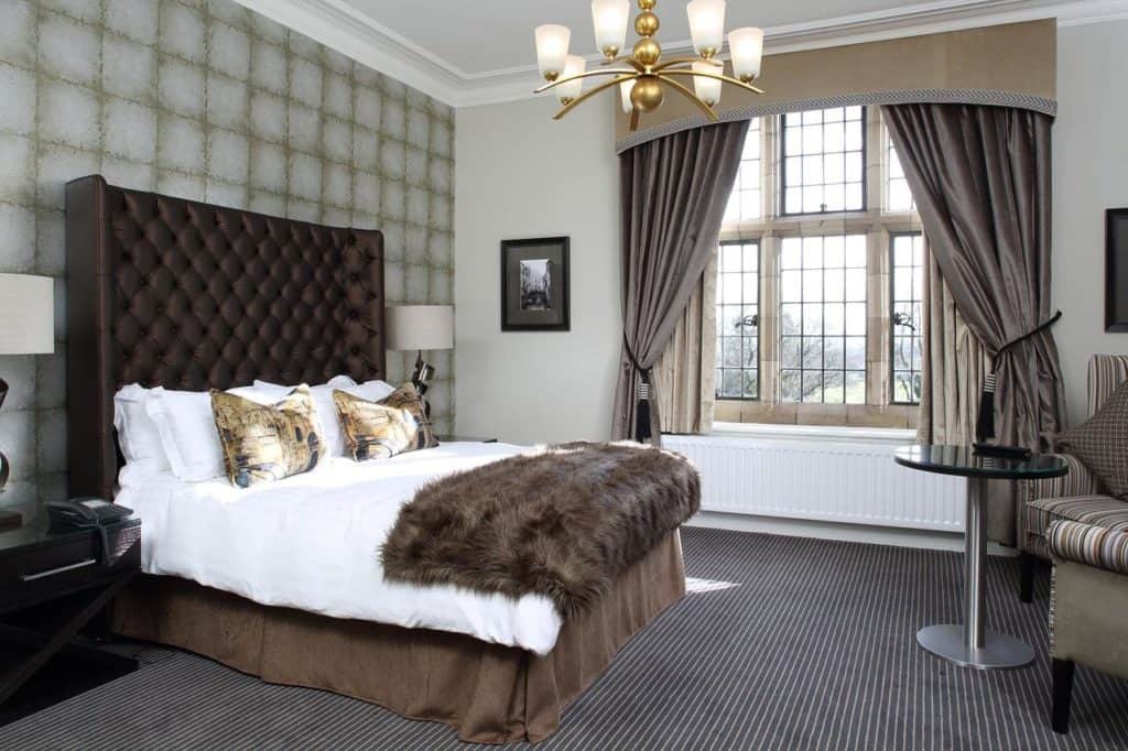 Inside a spacious family room at family-friendly boutique hotel at Moxhull Hall 