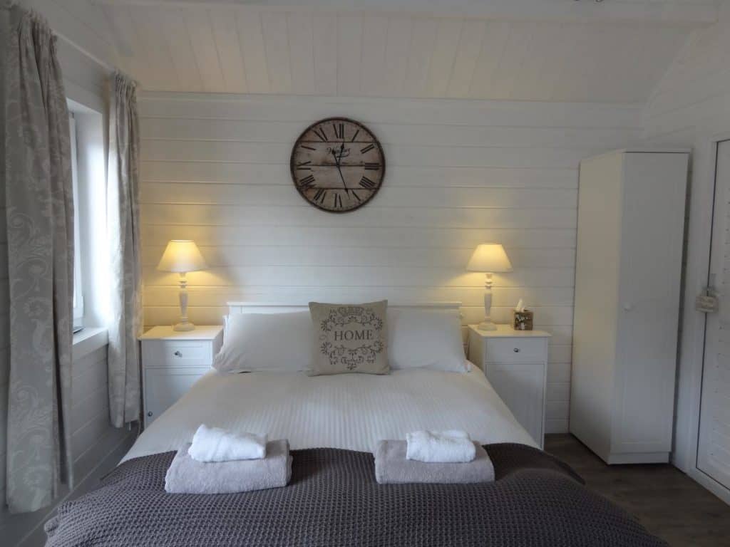 A comfortable double bed inside kid-friendly Park Farm’s family room that sleeps 3