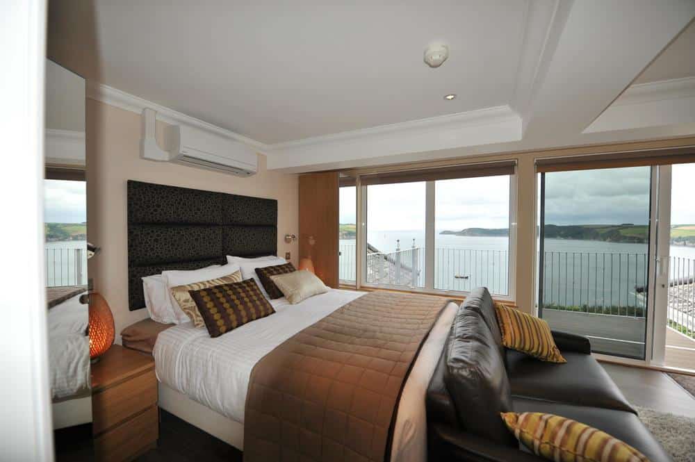 Inside a family room of Porth Avallen Hotel overlooking the sea view over Carlyon Bay