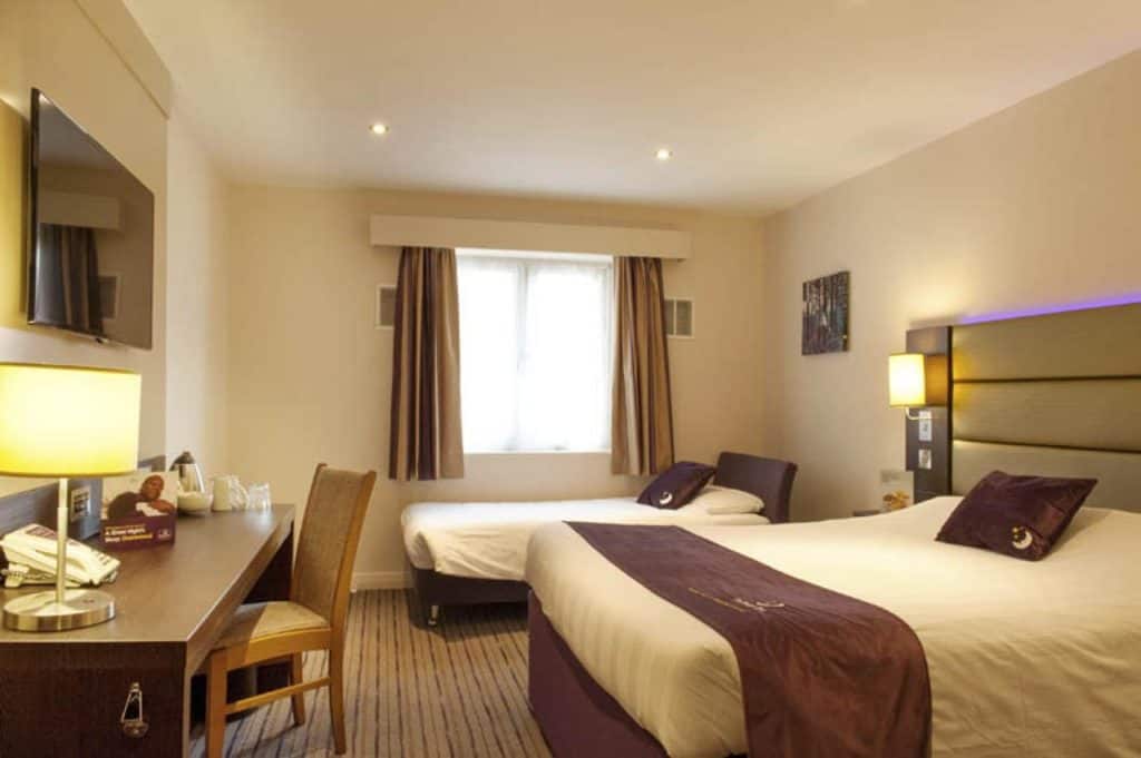 Inside a family room that sleeps 3, with extra bed at Premier Inn Southampton West