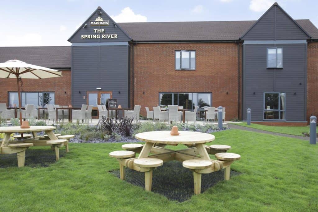 Family picnic area right outside Spring River Ebbsfleet by Marston's Inns