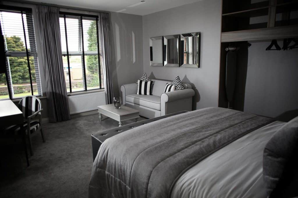 Gray-themed room at the family-friendly boutique hotel, The Eccleston Arms near Knowsley Safari Park