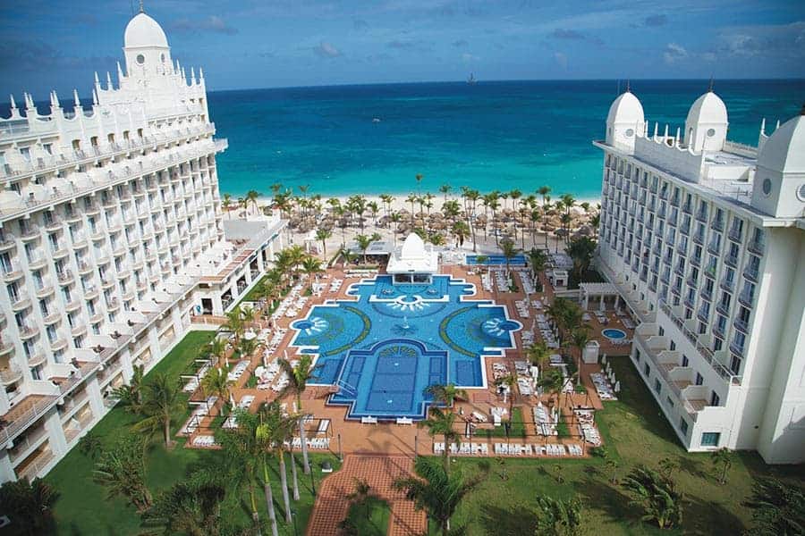 Aerial view of the beach and resort of the luxurious kid-friendly hotel Hotel RIU Palace Aruba