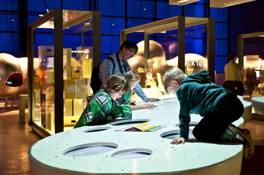 kids having fun exploring the science museum in london