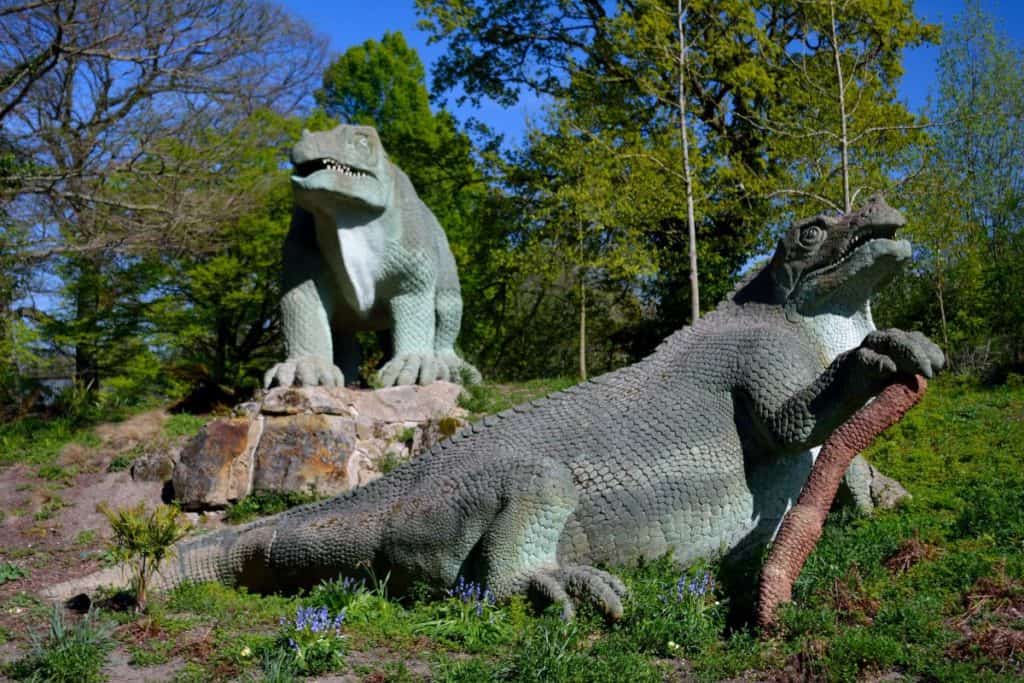 life like dinosaur statues inside crystal palace park