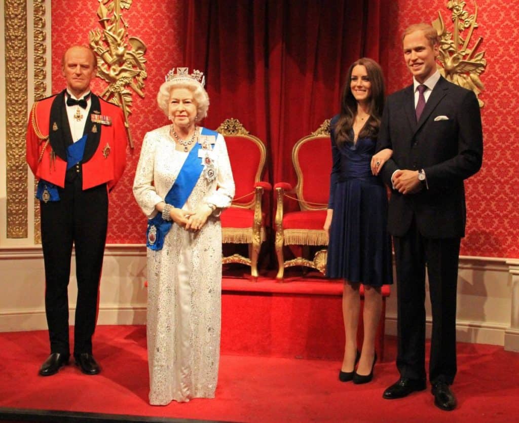 queen elizabeth II and the rest of the royal family's wax versions at family-favorite tourist spot, madame tussauds london museum