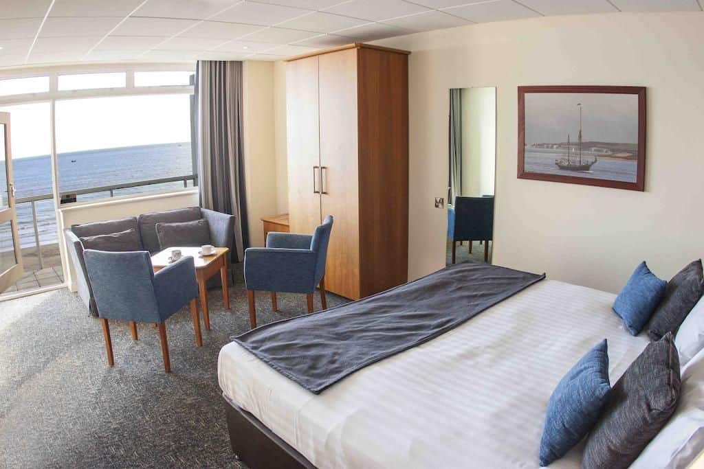 inside a bedroom overlooking the seafront at the Sandbanks Hotel in Poole Dorset