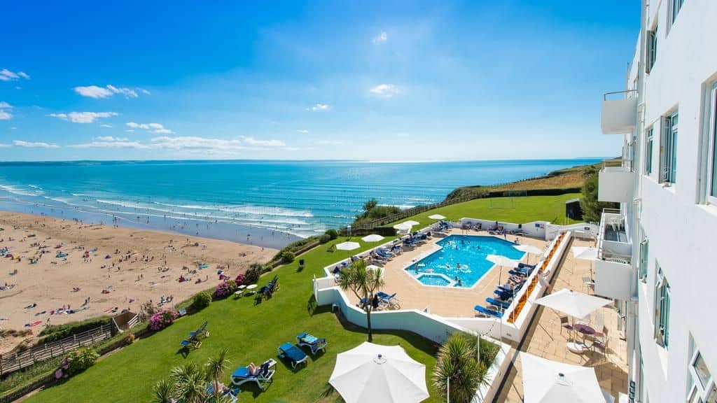 View from the Saunton Sands Hotel overlooking the swimming pool, terrace and the beach