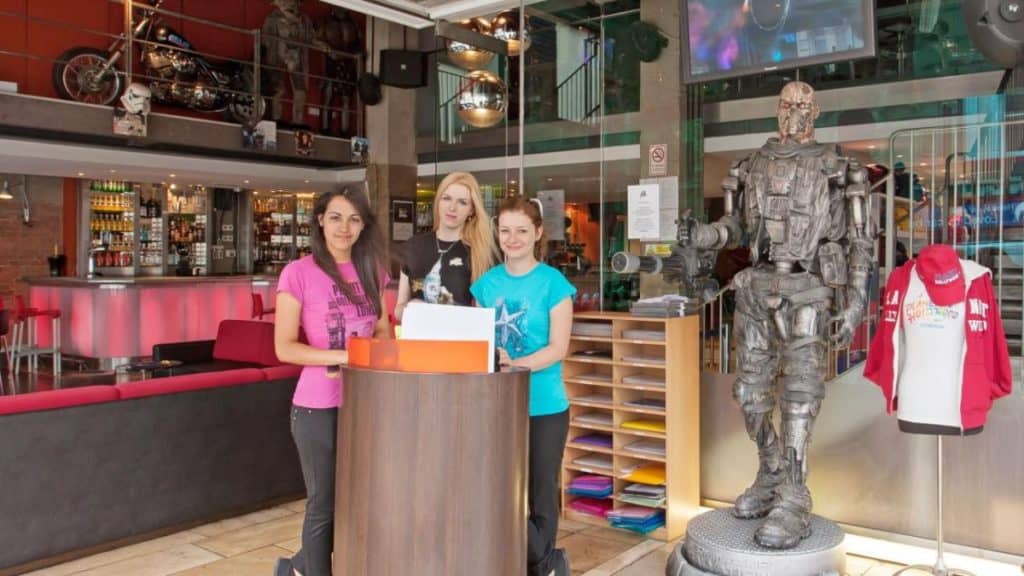 teenagers taking a photo with Terminator robot at planet hollywood