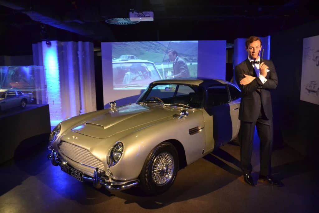 wax figure of james bond and his car at kid-friendly london film museum