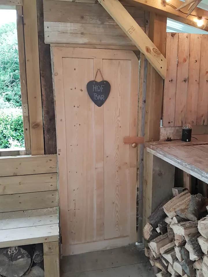 Door from the bar leading to the log library.