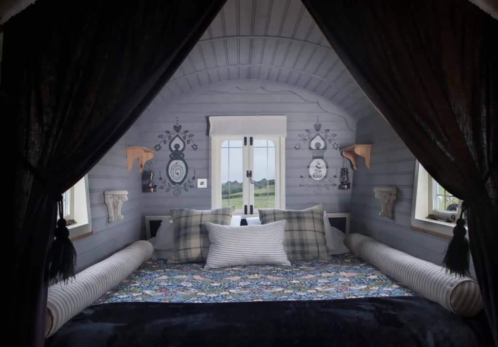 Lose yourself in the luxurious kingsize bed that fills the gypsy wagon from wall-to-wall